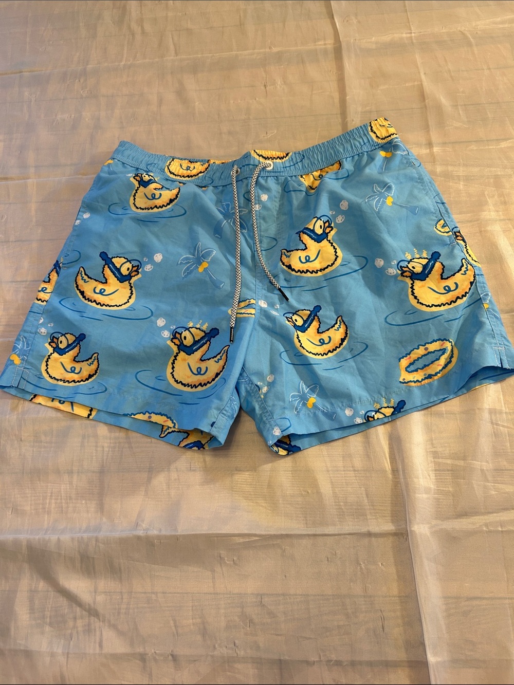 Men's Light Blue Duck Print Swim Trunks